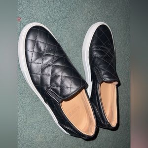 Black loafers